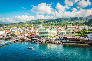 Bright and colorful landscape with cruise port and skyline of Roseau in Dominica, Caribbean Island