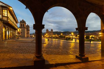 Twilight over the plaza de armas in the heart of Cusco old town in Peru with the cathedral in the Andes.