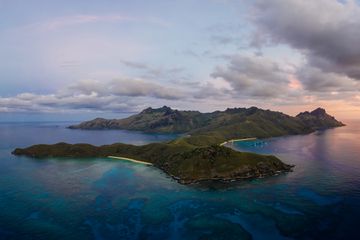 Aerial panorama of the sunset over the Waya island in Fiji