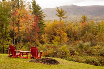 Adirondack chairs looking out over vista in Vermont USA