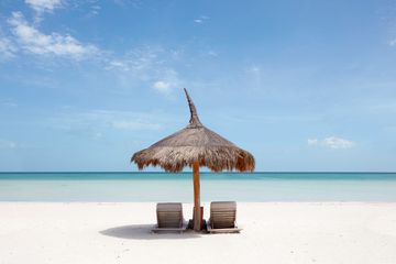 Beach Chairs and Umbrella on Isla Holbox, Mexico
