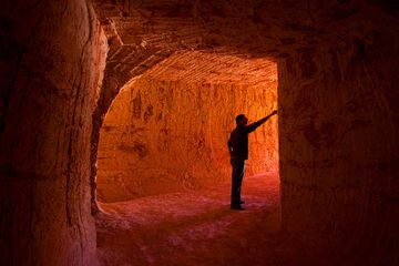 Man in Mine Tunnel, Coober Pedy, South Australia, Australia