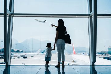 Mom and toddler traveling 