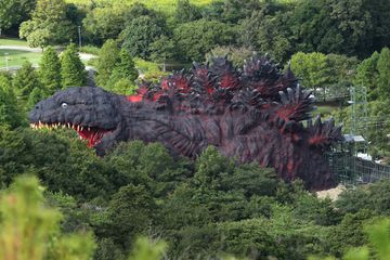 Godzilla replica zip-line ride pictured at the Nijigen no Mori theme park