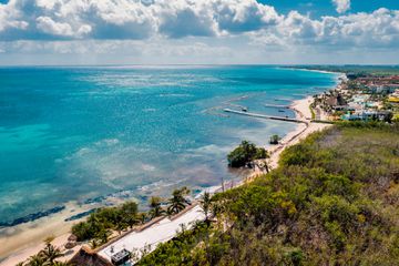 Aerial coastline view of Playa del Carmen, Mexico's bright blue waters