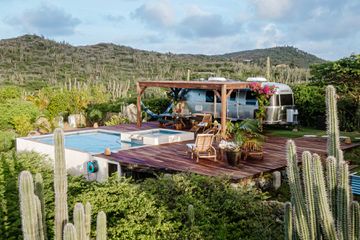 An Airstream trailer set up for camping in Aruba