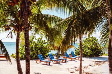 Lounge chairs on the beach in Belize