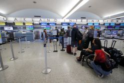Passengers check in at Oakland International Airports Terminal 1 