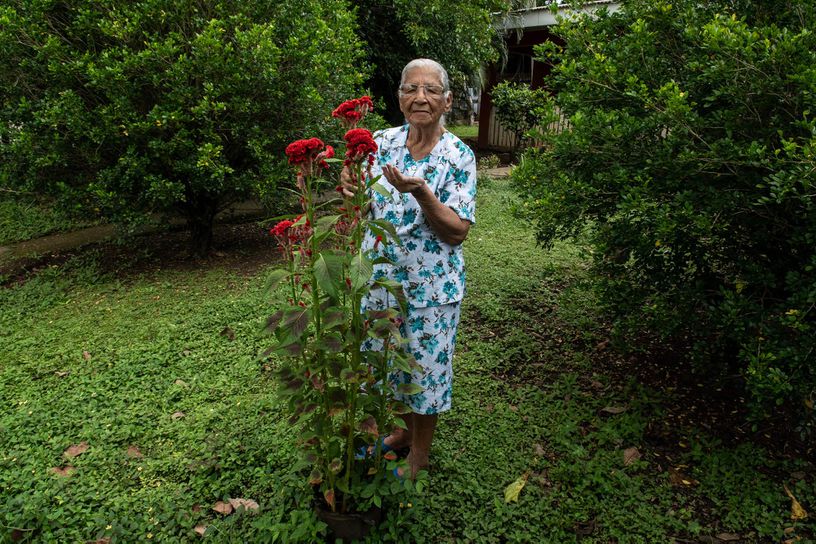 Clementina Espinoza, 91, takes care of her garden in Nicoya, Costa Rica, 