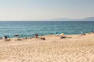 People relaxing and beach of Comporta, Sines, Alentejo, Portugal