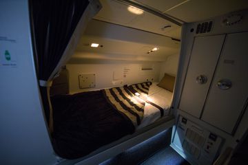 Sydney Australia, Crew Bunk bed under the roof of an aircraft. Prepaired with a blanket and pillow.