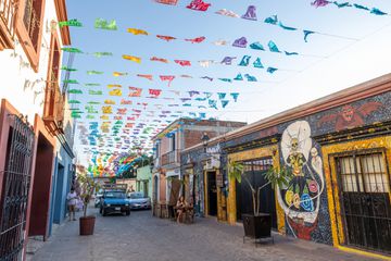 Colorful murals and flags in downtown Oaxaca