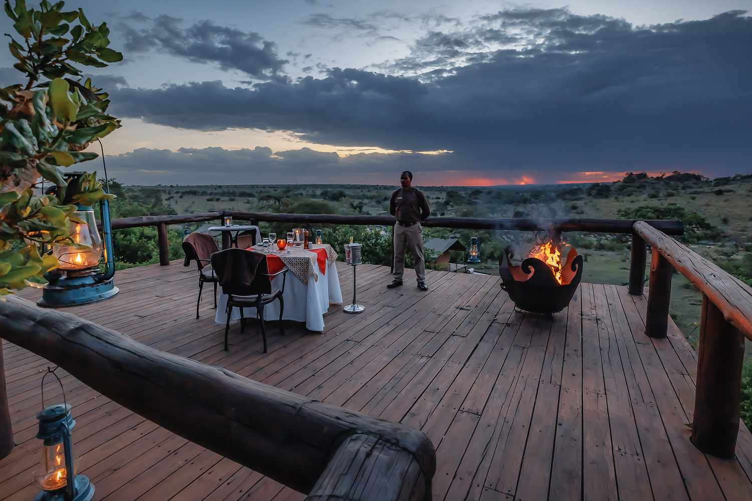 Outdoor dining at sunset at Elewana Serengeti Migration camp