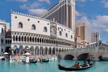 Guests riding in a gondola outside of The Venetian Las Vegas