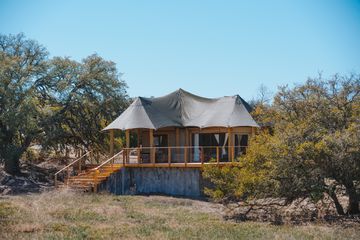 Exterior of a tented lodge at Outdoorsy Hill Country 