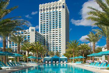 Exterior and the pool at Hilton Orlando Buena Vista Palace