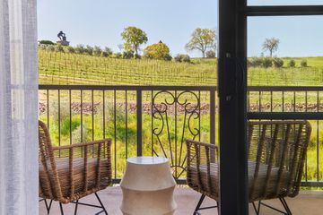 View of the estates vineyards from a King Room at The Meritage Resort & Spa in Napa