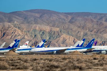 Dozens of retired commercial jet aircraft are parked at the Mojave Air & Space Port