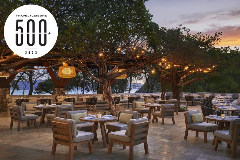 Outdoor dining at Four Seasons Resort Costa Rica at Peninsula Papagayo during sunset