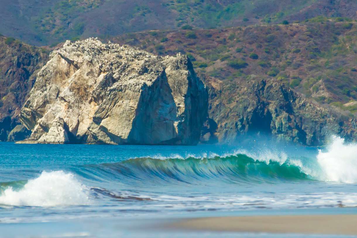 The paradise surf beach of Playa Naranjo and WitchÂs Rock in the Santa Rosa National Park in Guanacaste, Costa Rica