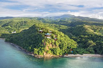 View of the cliffside villas at Secret Bay in Dominica