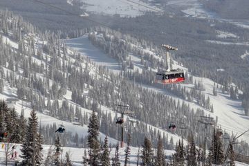 View of aerial tram and ski lift at Jackson Hole Mountain Resort during winter