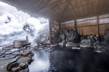 Onsen during winter with snow outside at Lamp no Yado in Japan