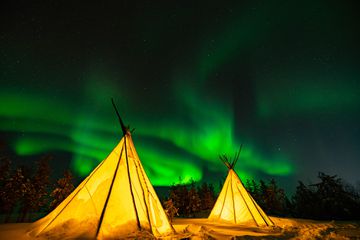 The aurora, glowing over Yellowknife city
