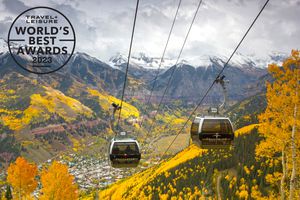 Ski lift in autumn over Madeline Hotel and Residences, Auberge Resorts Collection