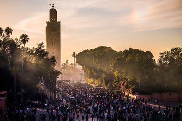 Sun beams from Koutoubia Mosque onto the ancient Medina district of Marrakech. 
