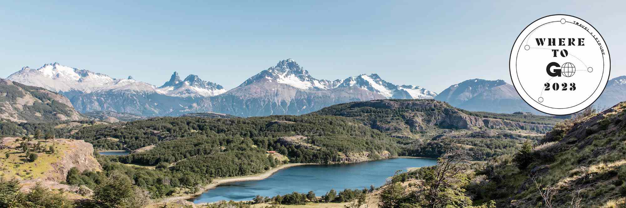 Landscape of a lake and snow capped mountains in Aysen, Chile 