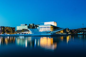 Oslo opera house lit up at night