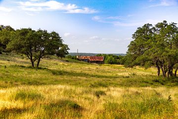 Texas Ranch with rolling hills in Wimberley Texas. Vacant Texas Ranch with Texas Hill Country landscape.