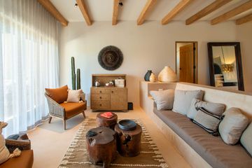 Villa living room area with natural decor at Rancho Pescadero