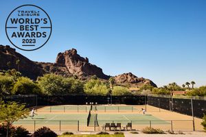 Tennis courts with Camelback Mountain in background at Sanctuary Camelback Mountain resort in Airzona