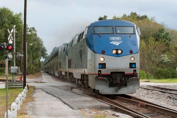Amtrak Auto Train transporting passengers and their cars, operates daily between Sanford Florida and Washington DC .