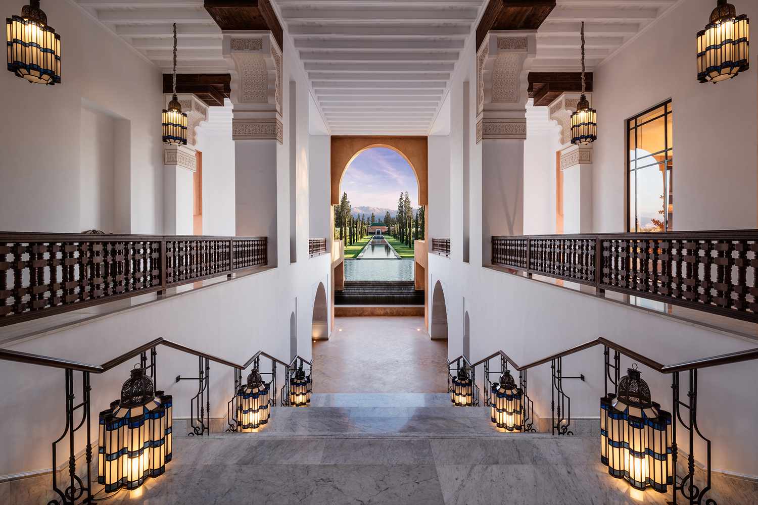 Hallway stairs with lanterns and view at The Oberoi, Marrakech