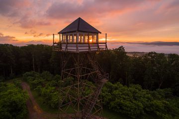 The Thorny Mountain Fire Tower in West Virginia during sunset 