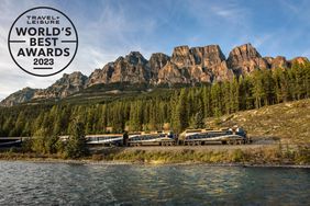 view of the Rocky Mountaineer train as it passes Castle Mountain