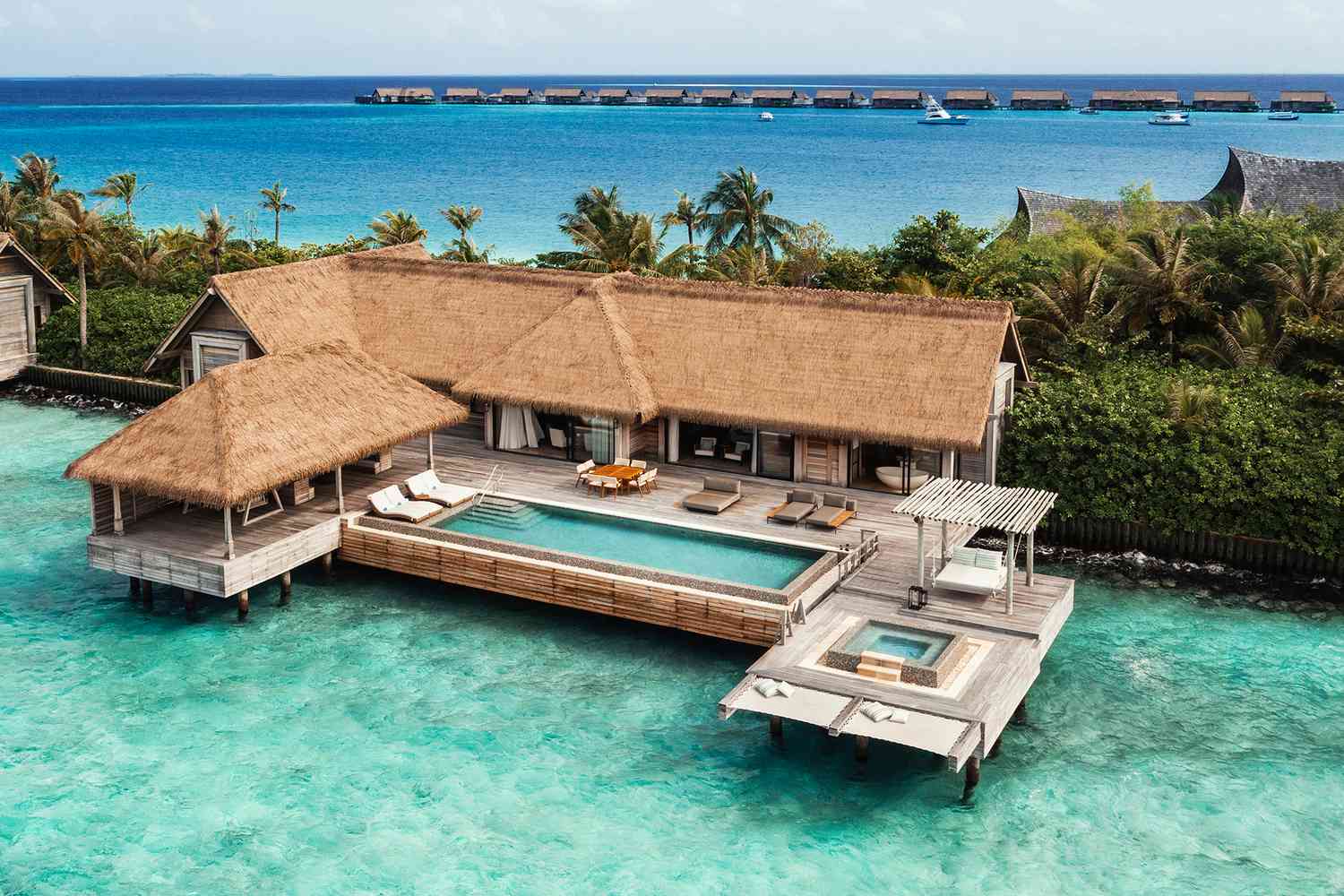 Exterior view of overwater bungalow at Waldorf Astoria Maldives Ithaafushi