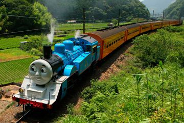 This picture taken on July 2, 2014 shows a life-sized Thomas the Tank Engine making a test run in the mountains on a line run by Japan's Oigawa railway near the city of Shimada in Shizuoka prefecture, west of Tokyo.