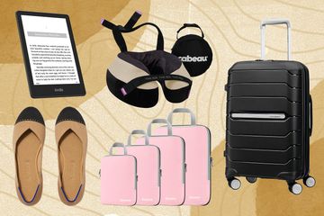 An assortment of items to pack in a carry-on displayed on a swirly gold background